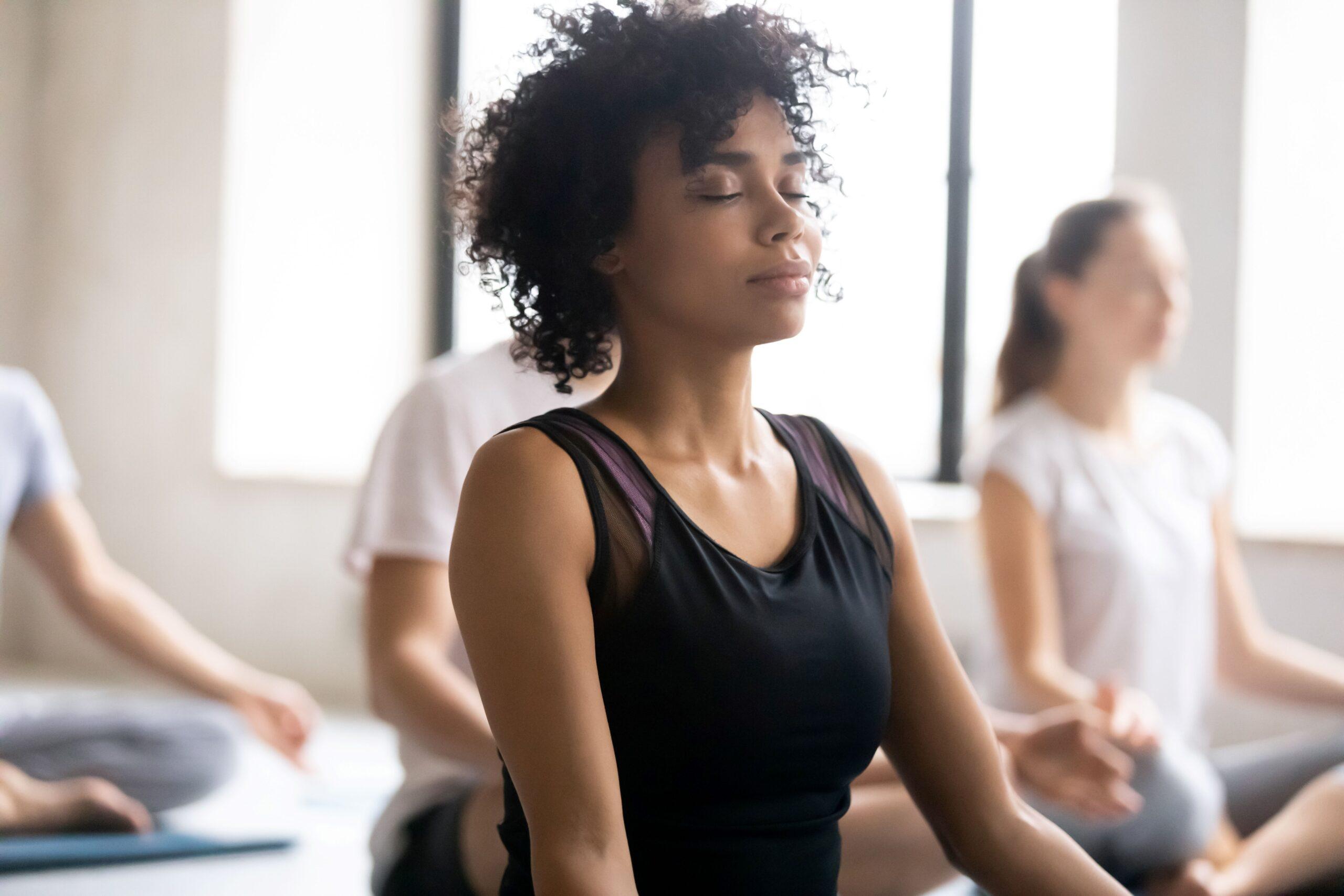 Students Breathing Deeply in Yoga Class